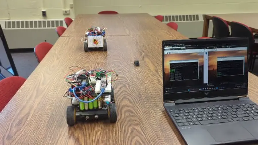 Leader and follower robots aligned before the Auto-Platoon trial