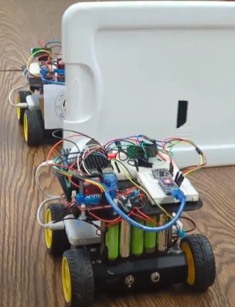 Physical obstacle placed in front of the follower robot