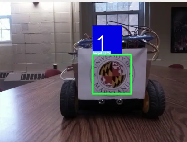 Leader robot with a persistent tracking identifier in the follower camera